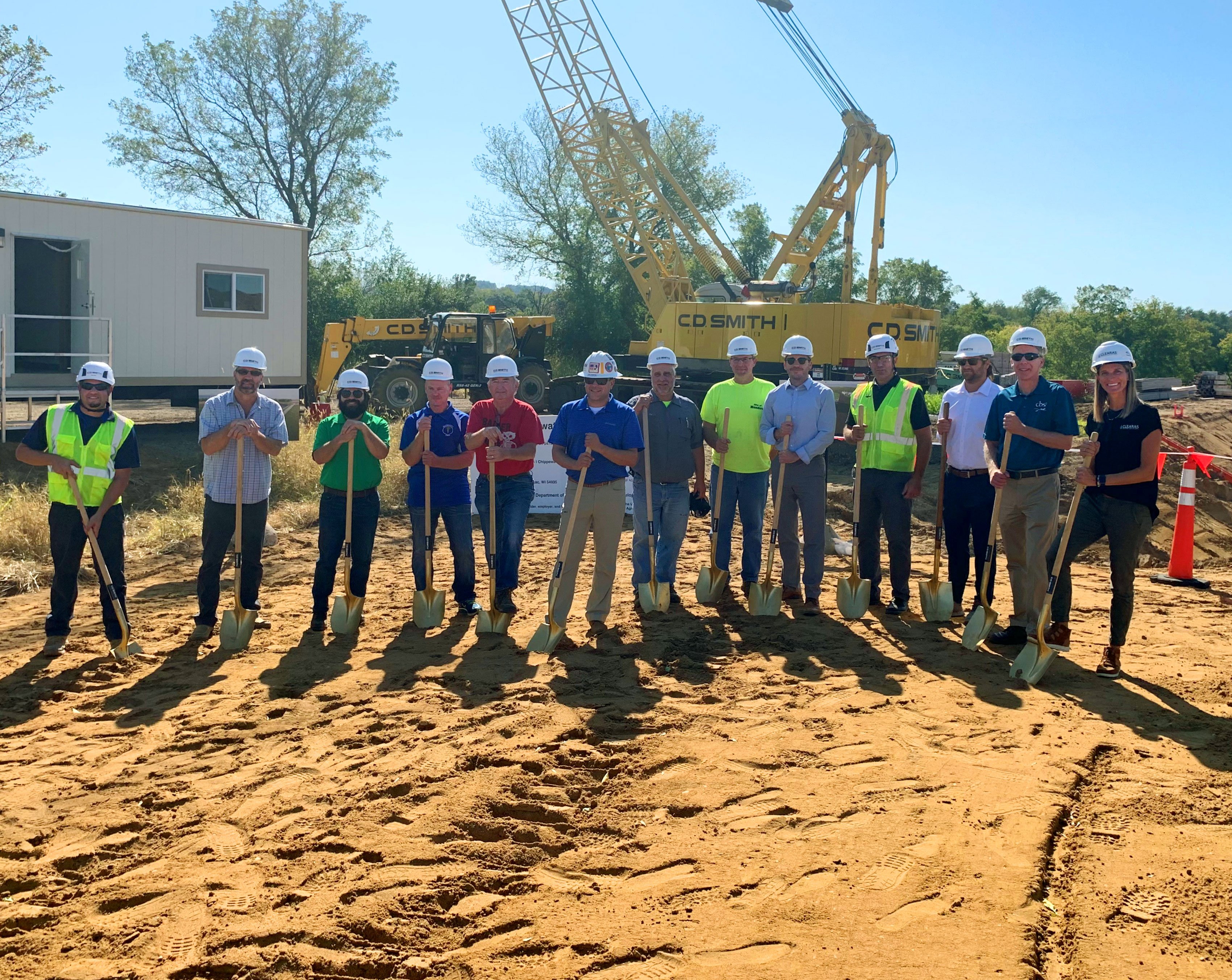 Government officials, business leaders & the C.D. Smith Construction project team celebrate the Mondovi Wastewater Treatment Plant facility groundbreaking.