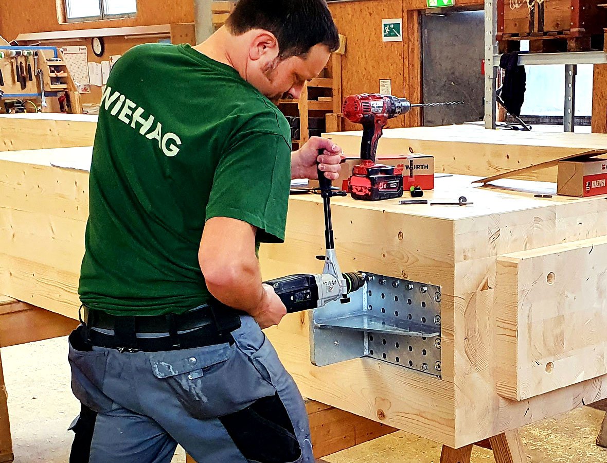 Wiehag Timber Construction steel connections & CNC engineered wood glulam column tallest mass timber building Ascent project