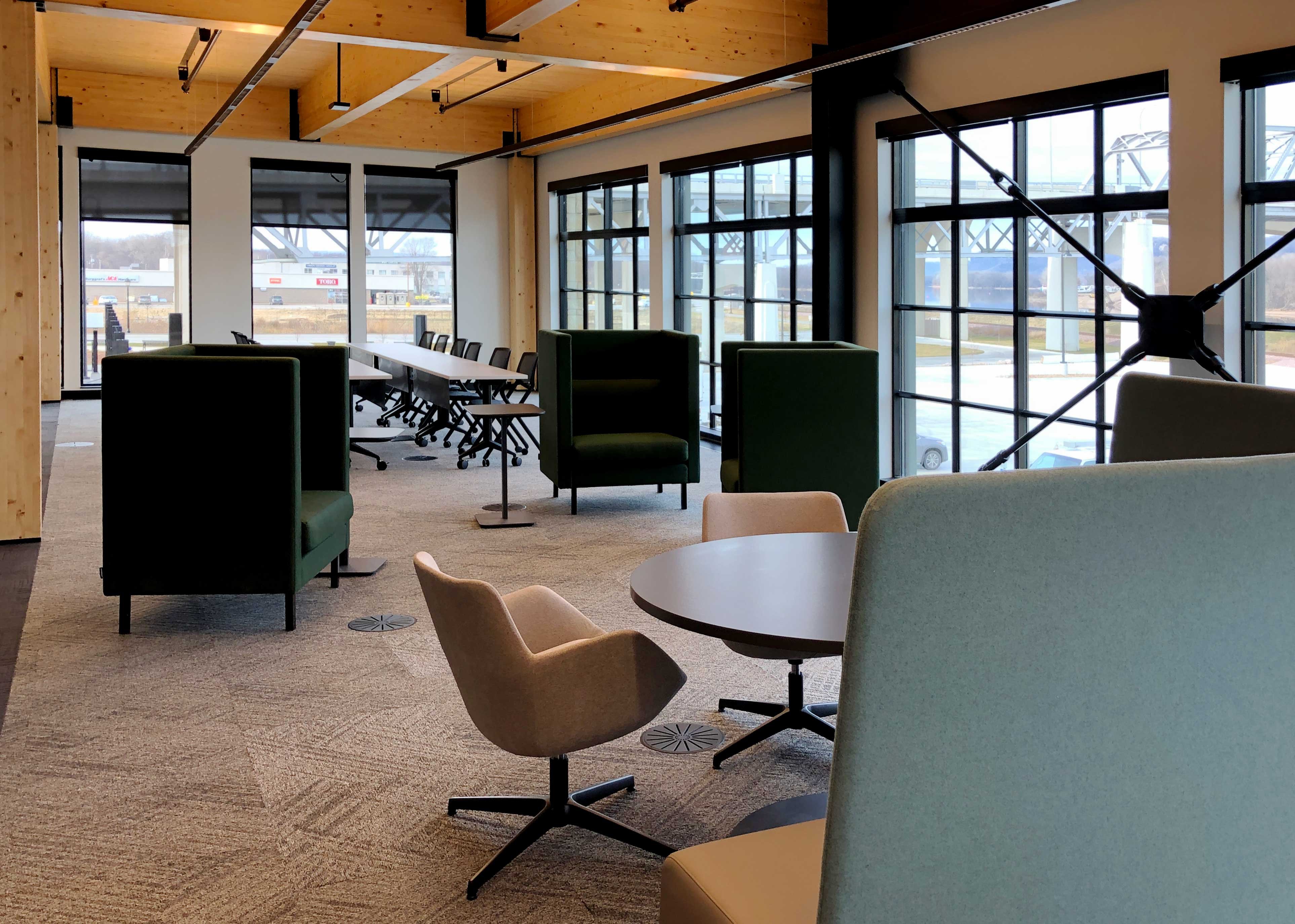 C.D. Smith Construction Manager for Fastenal Corporate Office Mass Timber Building Interior staircase with view of downtown Winona street