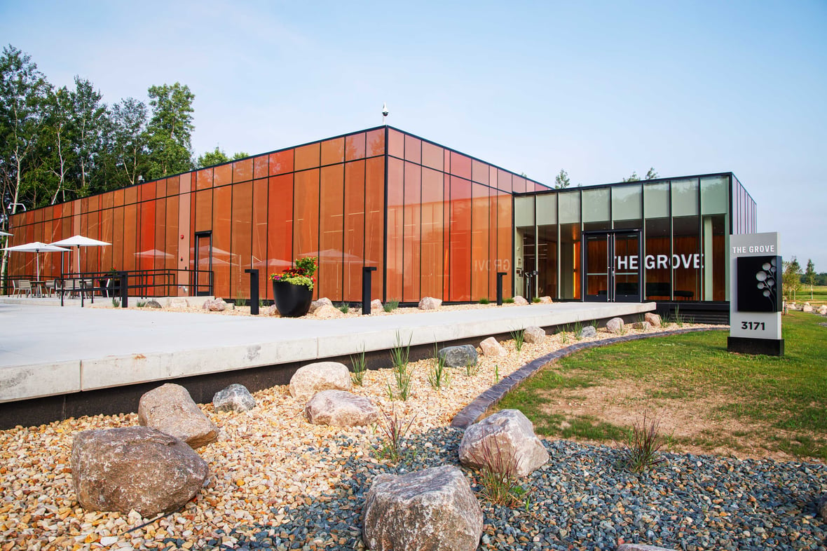 Exterior view of The Schneider National Grove Innovation Center building in Green Bay, Wisconsin, featuring a contemporary design with a focus on sustainability