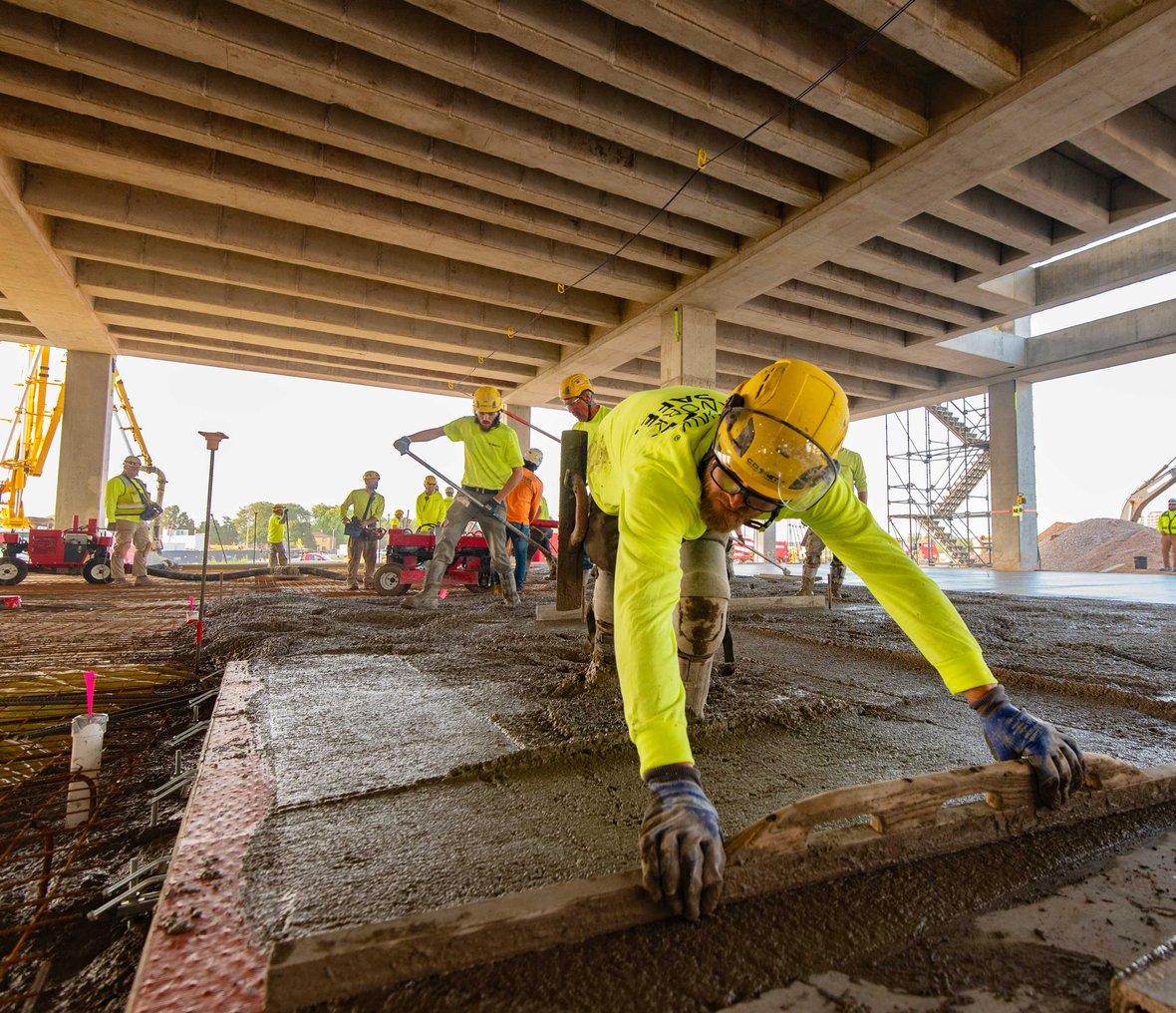 Construction crew pours concrete foundation for the Forensic Science and Protective Medicine Facility in Wauwatosa, Wisconsin — part of a state-of-the-art healthcare and forensic lab development.