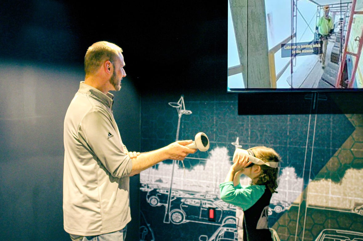 CD Smith Virtual Design + Construction expert mentors student from Boys & Girls Club of Fond du Lac using VR Headset in Wisconsin project environment
