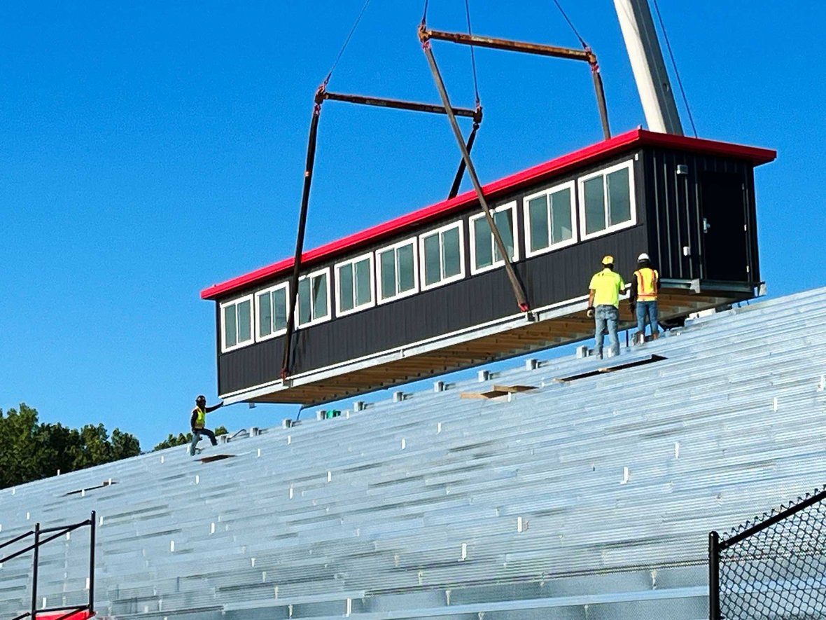 06 Fond du Lac School District Athletic Stadium Construction with CD Smith Crane lifting Press Box into Place-IMG_1145