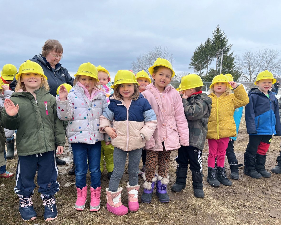 07 Students gathered at St. Matthew School daycare project groundbreaking with CD Smith Construction Wisconsin