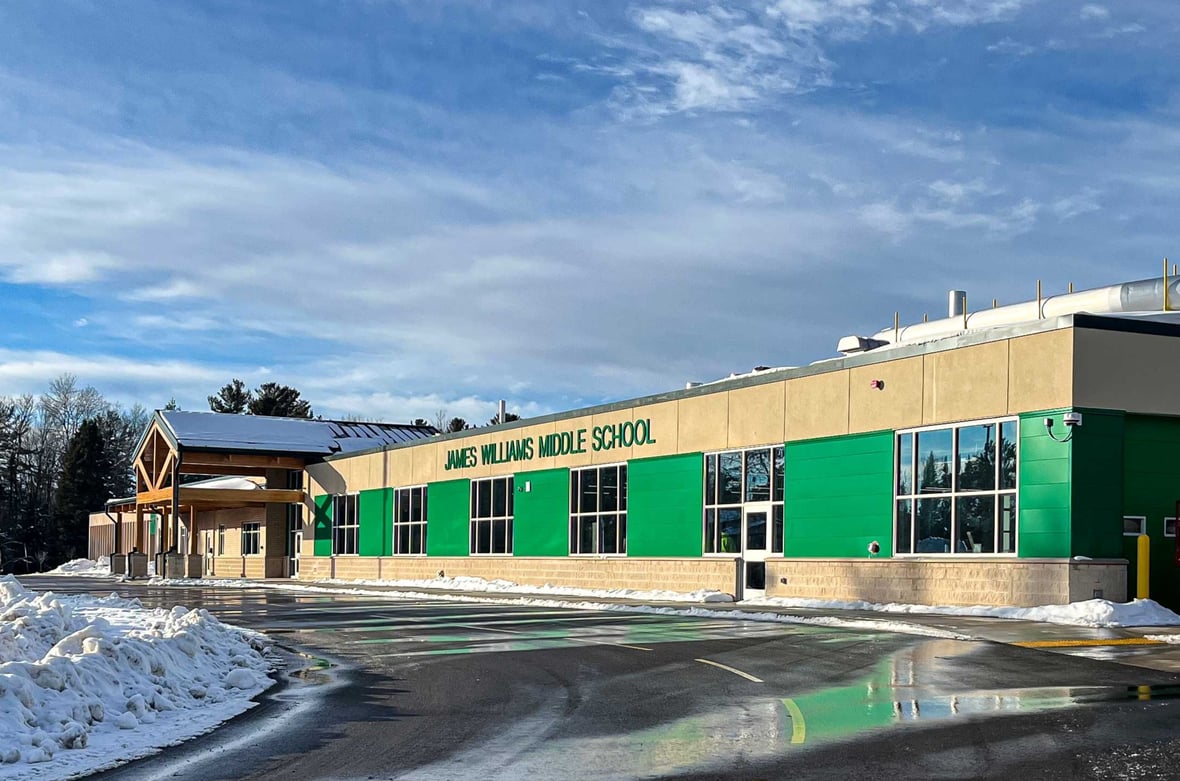 Exterior of James Williams Middle School showing updated entrance and building improvements following renovation and addition project