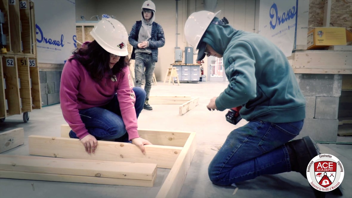 ACE Academy student learning wall building framing HVAC or electrical skills as part of Wisconsin's high school construction training program.