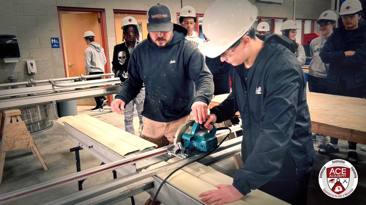 Construction industry mentor working alongside students at ACE Academy, supporting workforce development and hands-on learning.