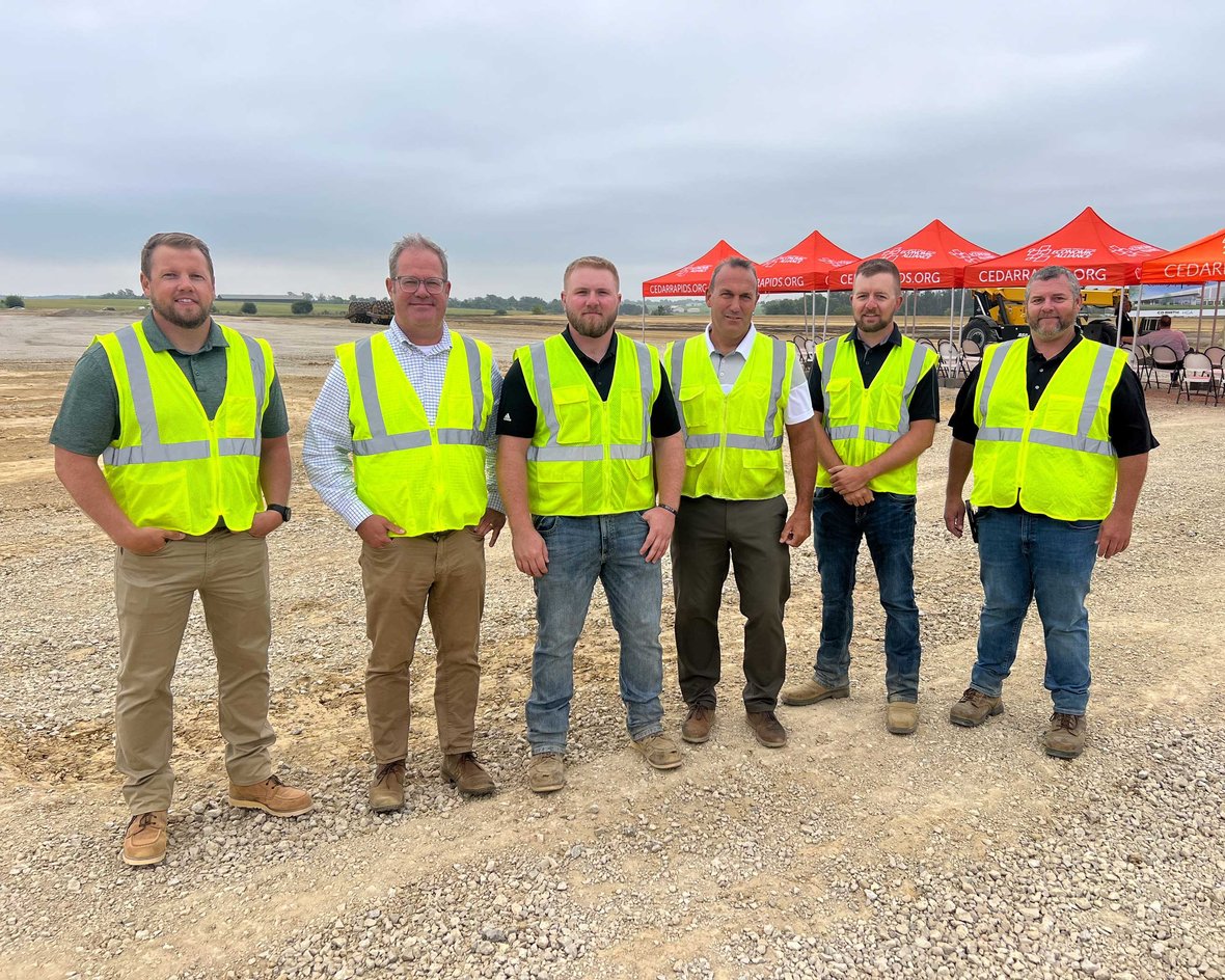 CD Smith Construction Team with Cedar Rapids tents in background at Sub-Zero Manufacturing Facility Building Project Groundbreaking Event