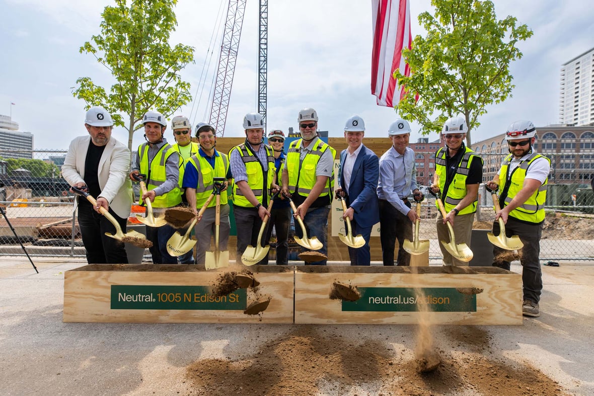 CD Smith Construction and Neutral Edison team shoveling dirt at mass timber building groundbreaking ceremony in Milwaukee Wisconsin