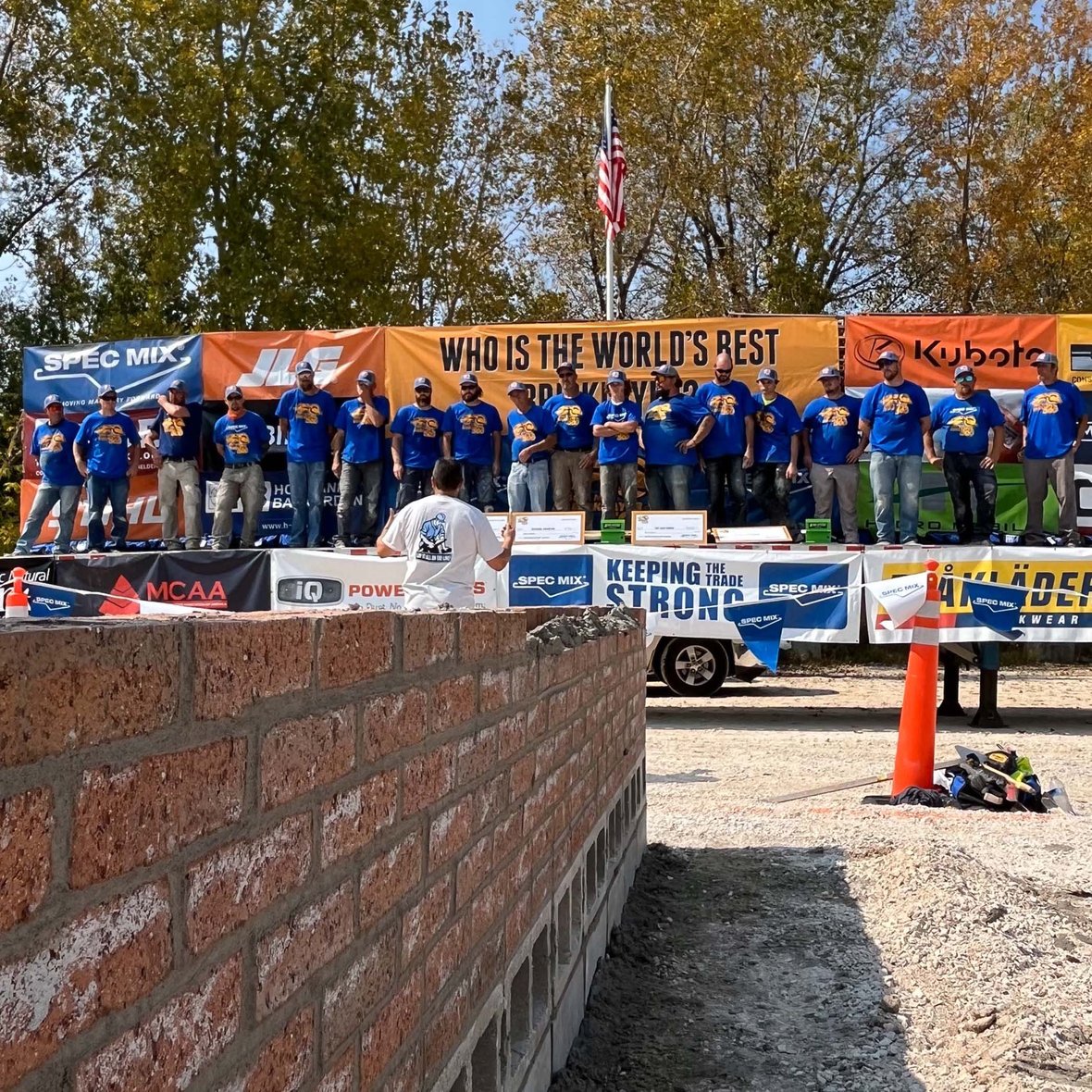 CD Smith Construction masonry teams on stage at SPEC MIX Bricklayer 500 in Fond du Lac Wisconsin 20240911_173613932_iOS