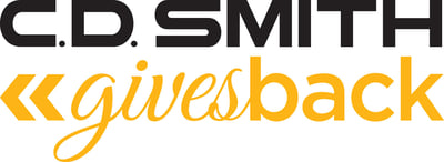CD Smith Construction Gives Back logo for building community where we live and serve