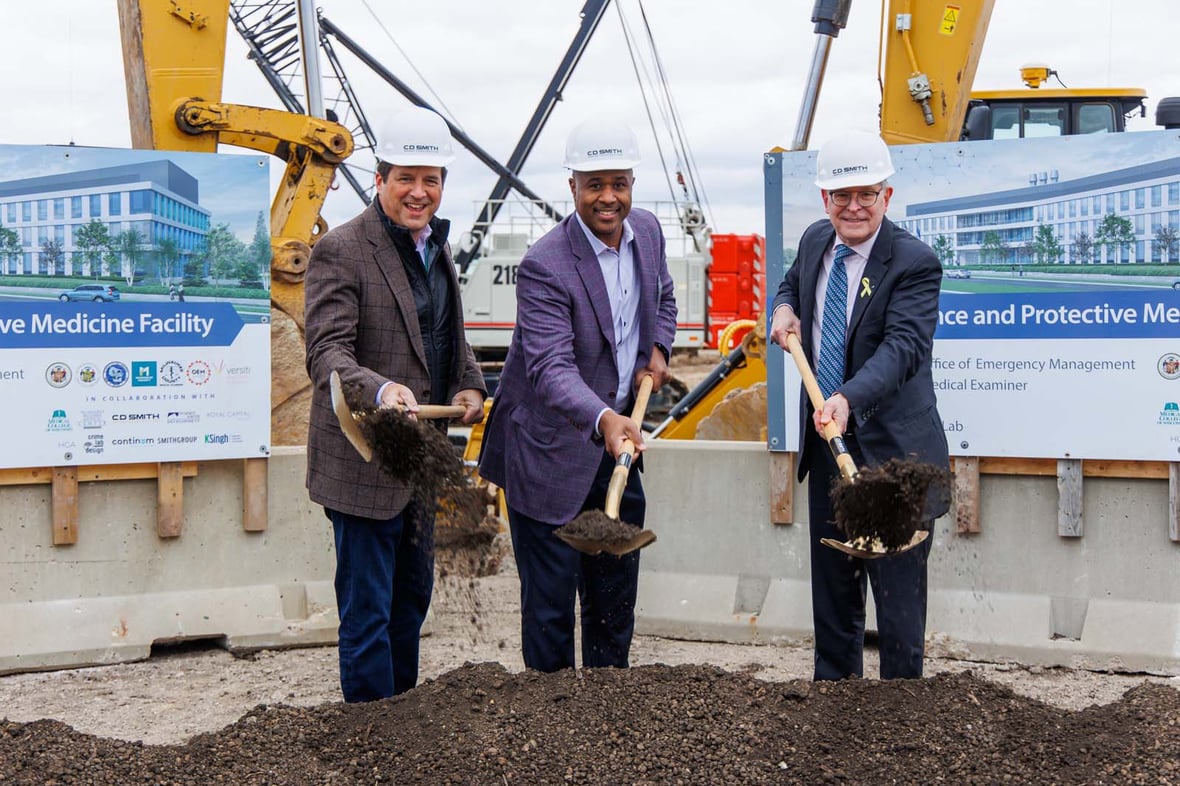 Josh Kaul, Chris Miskel and Dr. John Raymond MD CEO of Medical College of Wisconsin shoveling at groundbreaking ceremony for the Forensic Science and Protective Medicine Facility project construction with CD Smith