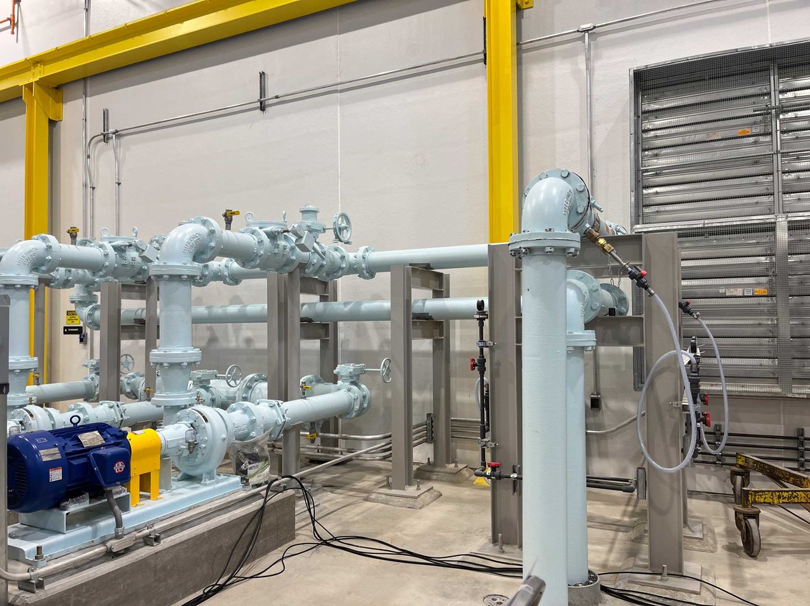 Completed Waukesha Water Utility construction project pipe and concrete work with CD Smith at ribbon cutting