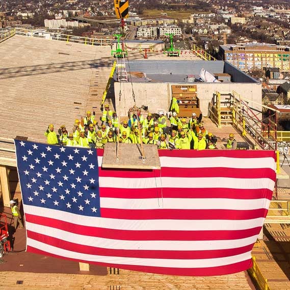 C.D. Smith Construction Crew and Project Team Topping Off World's Tallest Hybrid Mass Timber Building in Milwaukee, Wisconsin - The Ascent