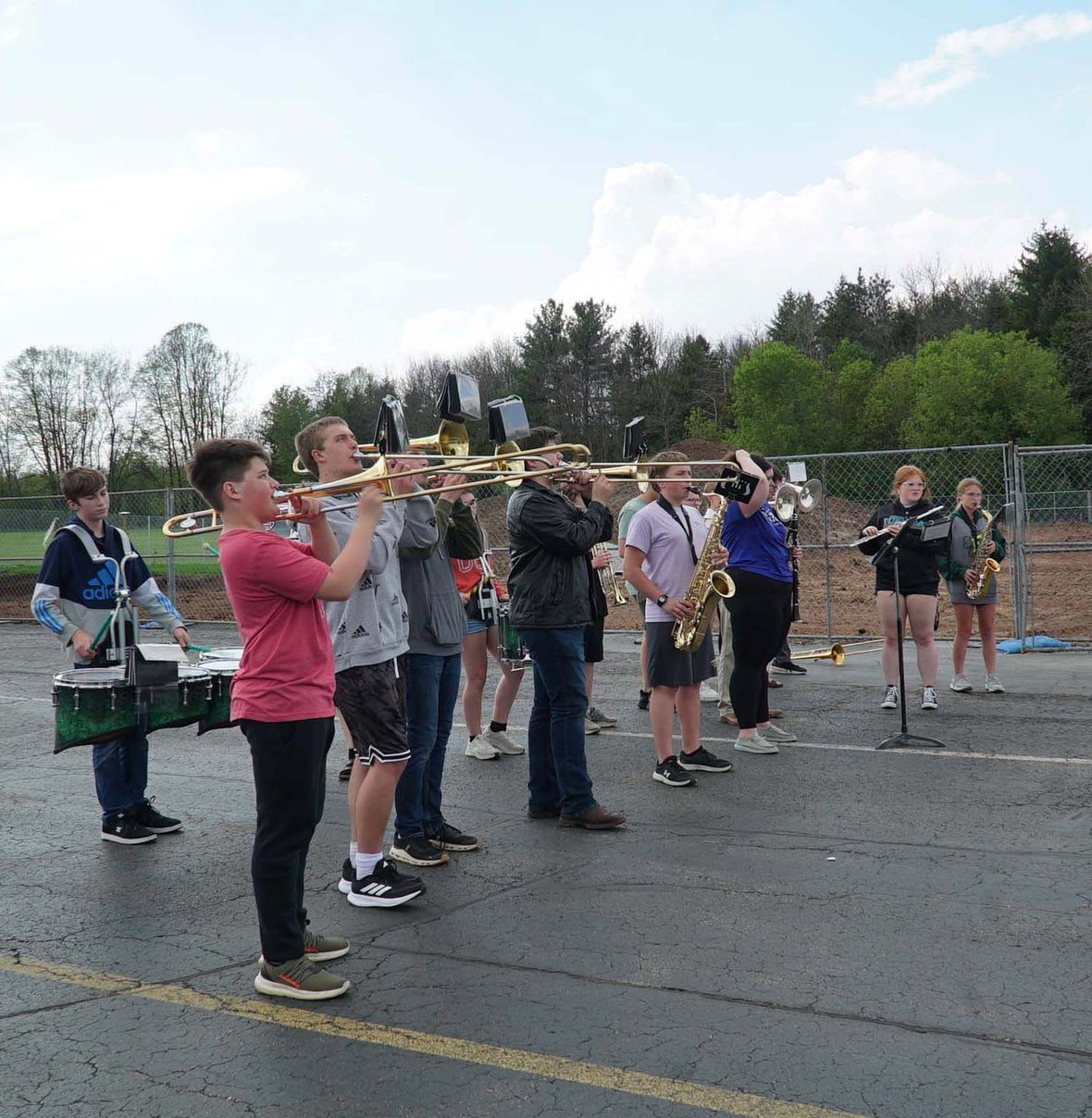 Freedom High School Band and Cheerleaders welcome guests with a spirited performance at the groundbreaking celebration.