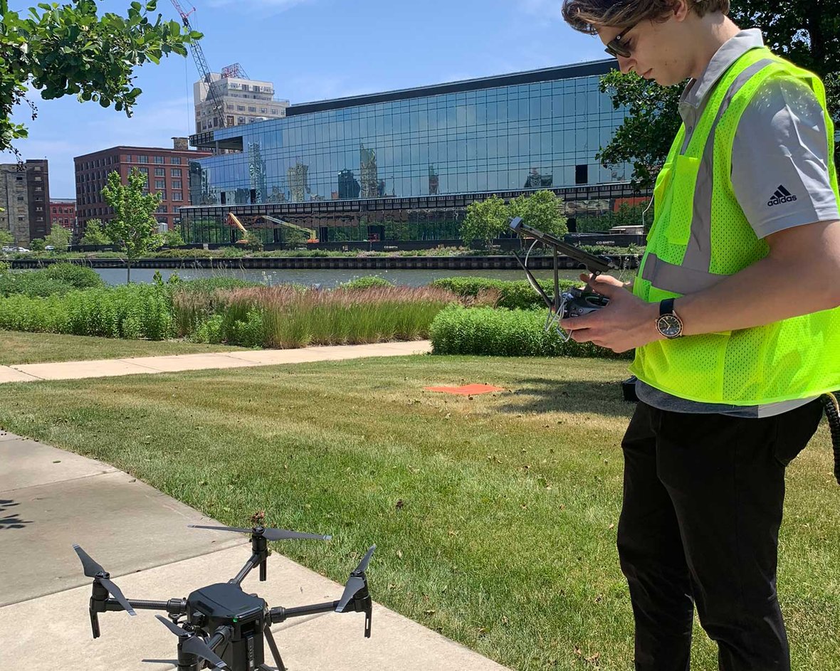 Virtual Design and Construction VDC Drone Pilot across river in Milwaukee by Rite-Hite for aerial project Update with CD Smith