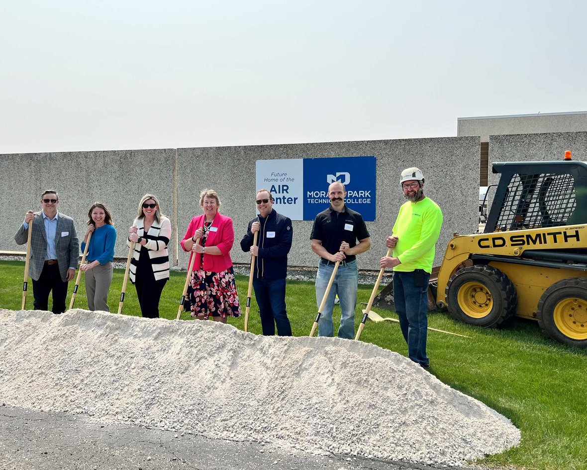 C.D. Smith groundbreaking participants pose with shovels at construction groundbreaking for AIR Center at Moraine Park Technical College