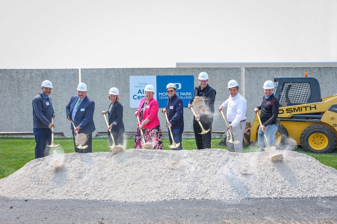 Groundbreaking participants pose with shovels at construction groundbreaking for AIR Center at Moraine Park Technical College