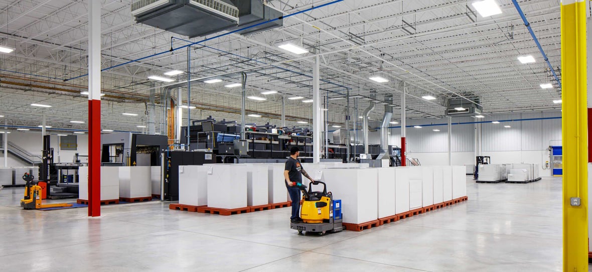 Green Bay Packaging Folding Carton Facility Industrial Interior and worker pallet jack in De Pere Wisconsin built by CD Smith Construction 