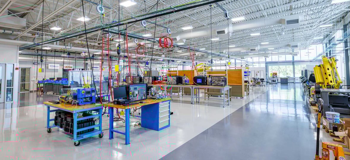 CNC tools and robotic equipment in the advanced shop space at Moraine Park Technical College AIR Center, built by CD Smith in Fond du Lac, Wisconsin.