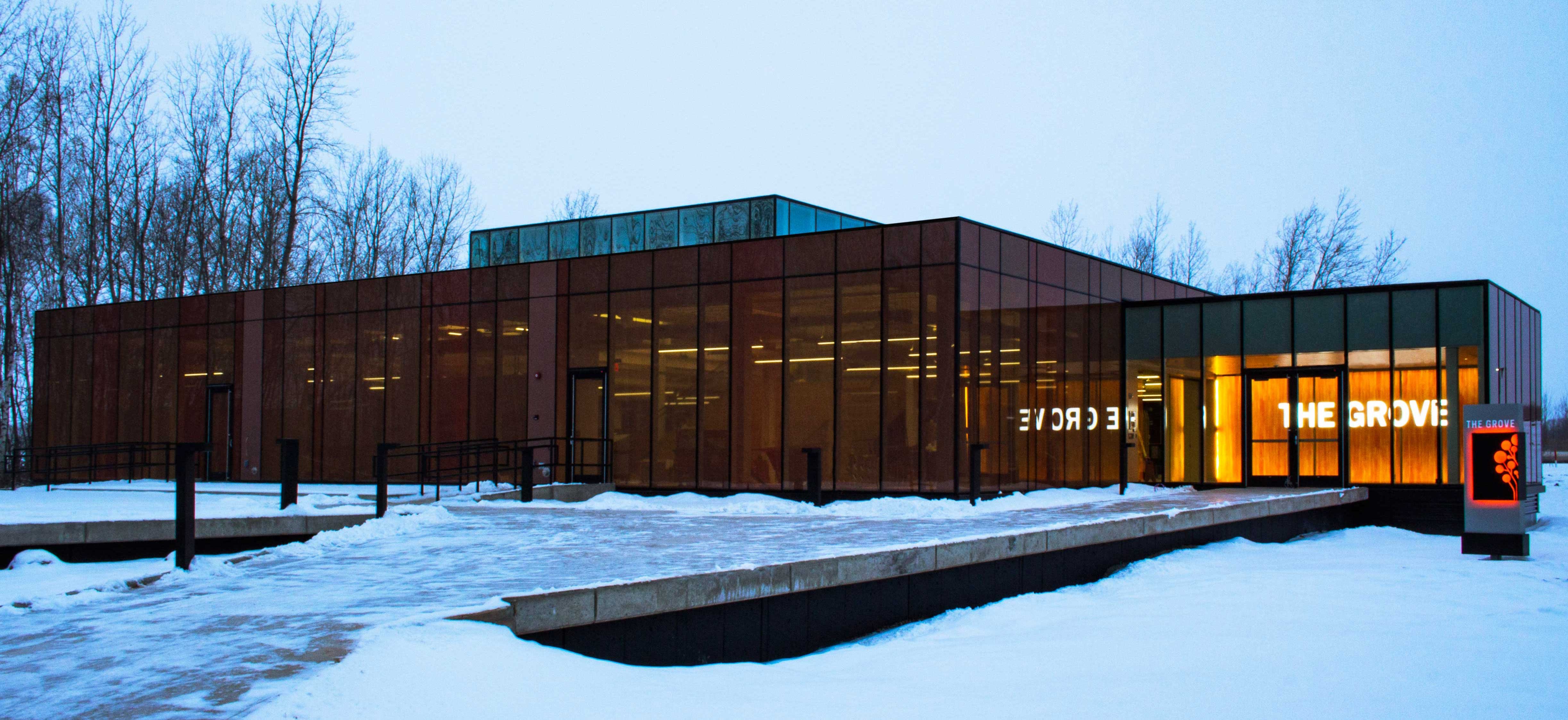 Schneider National The Grove Innovation Center corporate office exterior at dusk completed construction by CD Smith