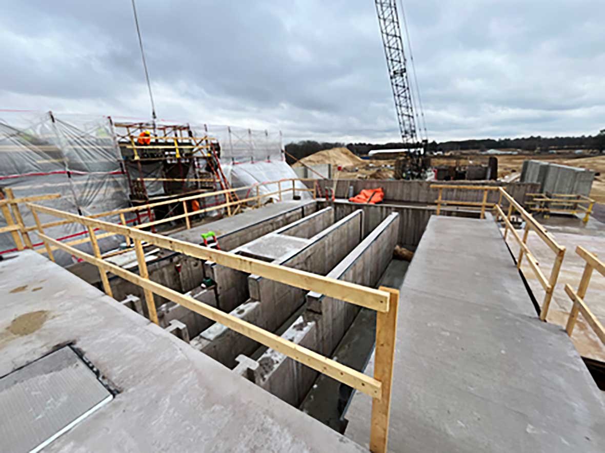 New concrete headworks and screening channels at the Reedsburg Wastewater Treatment Plant in Wisconsin illustrate high-quality municipal concrete construction and project engineering.