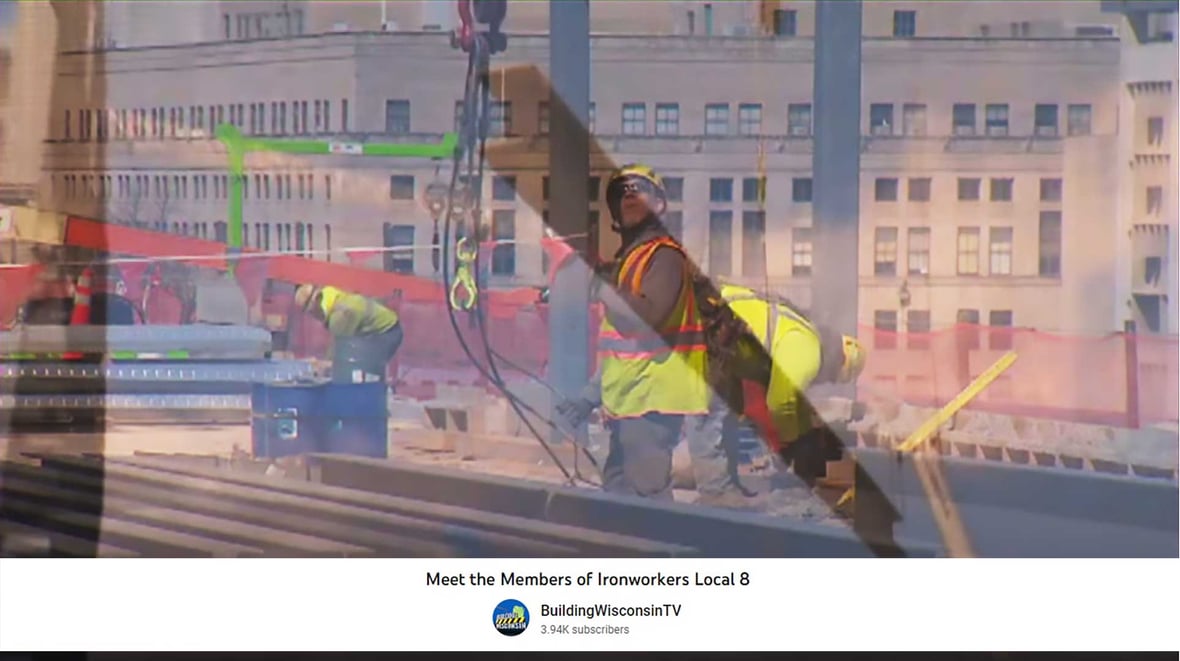 Hook-on Ironworkers with Steel Beams Rigging Construction Cranes at Wisconsin Baird Center Expansion Construction Project in Milwaukee