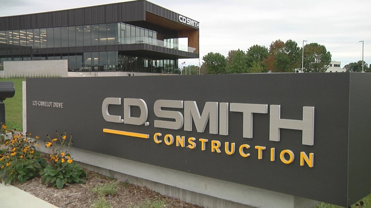 C.D. Smith Construction address block sign with Corporate Office in Fond du Lac, Wisconsin in the background