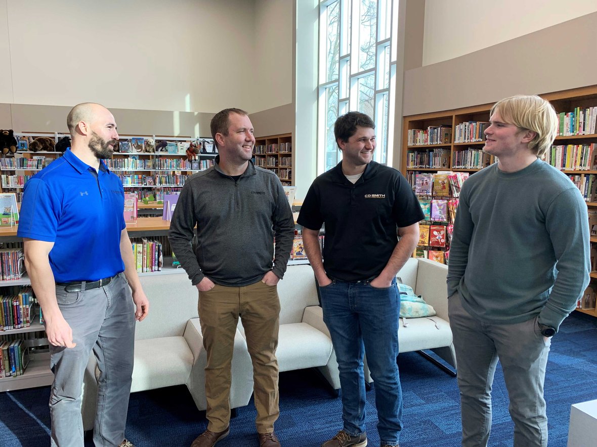 C.D. Smith project team in Kohler, Wisconsin Public Library at dedication ceremony