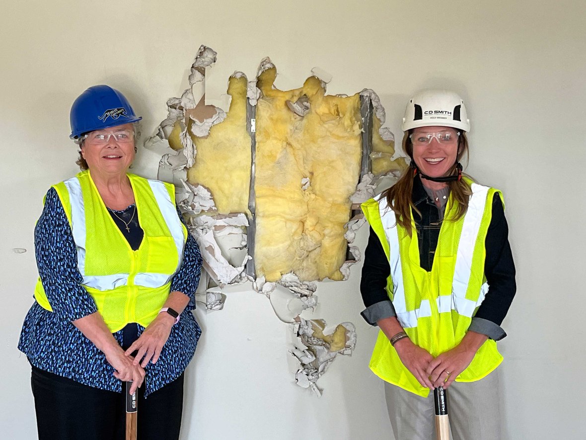 Marian University CD Smith Executives Faculty Students and Sisters pose for construction demolition bash celebration at new home of the Nursing Program