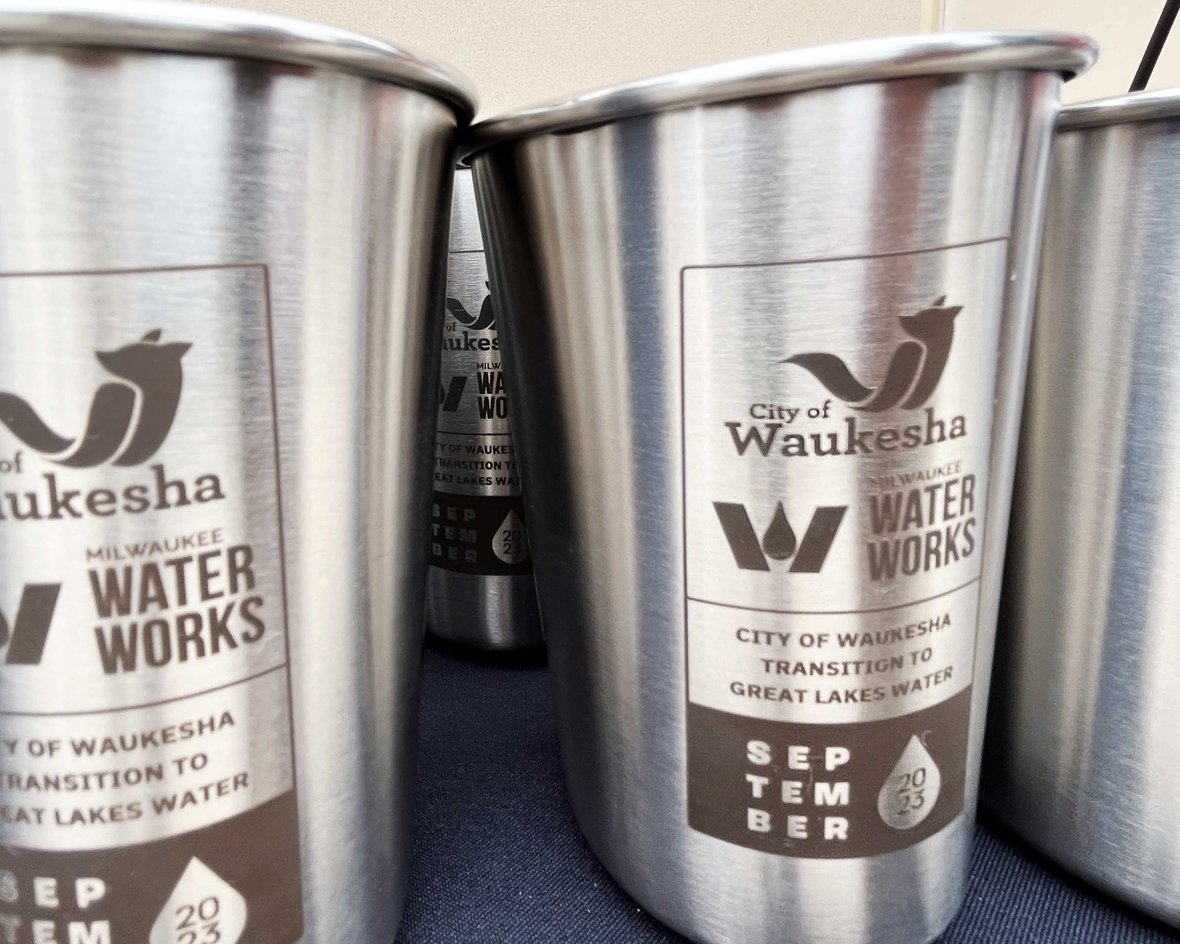 Metal cups for completed Waukesha Water Utility construction project ribbon cutting celebration