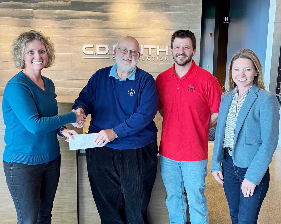 Connie Coon (at left) and Holly Brenner (at right) pictured with SHP WI-Racine/Kenosha Chapter President Michael Prudhom and Brian Nelson at C.D. Smith Construction's Fond du Lac Corporate Office