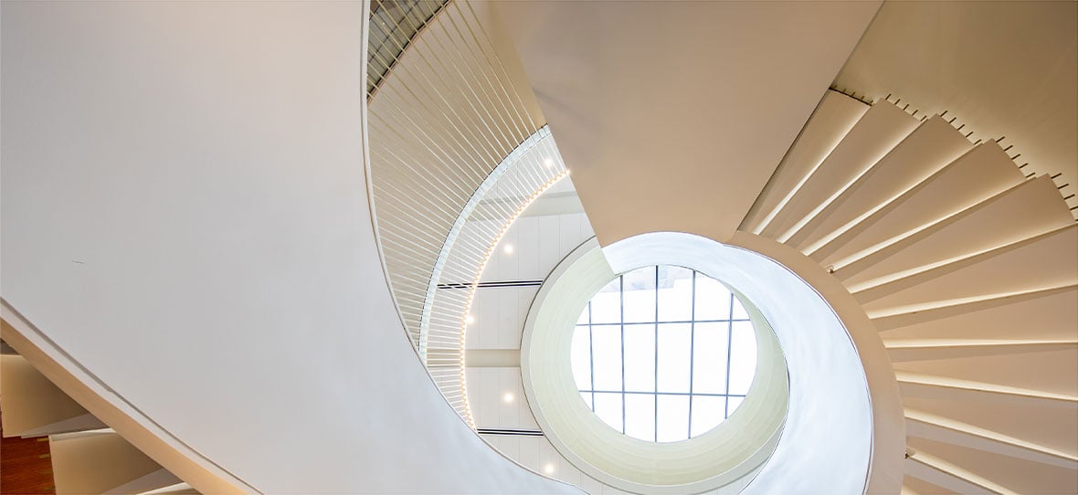 Atrium Spiral Staircase of Milwaukee Symphony Orchestra Warner Grande Theatre historic restoration construction building modern Bradley Symphony Center