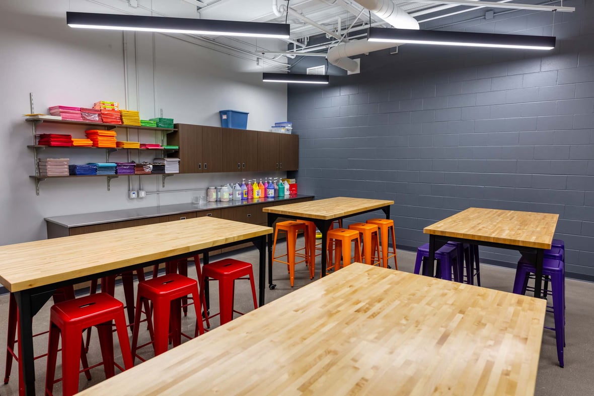 Colorful classroom space at the Ripon Boys &amp; Girls Club featuring flexible seating and art supplies—part of a youth-focused facility built through commercial construction services in Wisconsin to support creativity, learning, and enrichment.