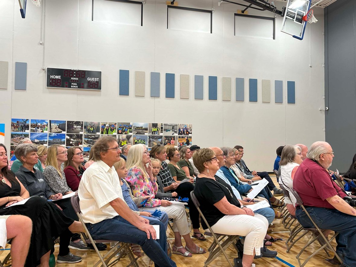 Ripon community members gather inside the new Boys &amp; Girls Club gymnasium to hear speakers during the ribbon cutting ceremony—celebrating the opening of a youth-focused facility built through commercial construction services in Wisconsin.