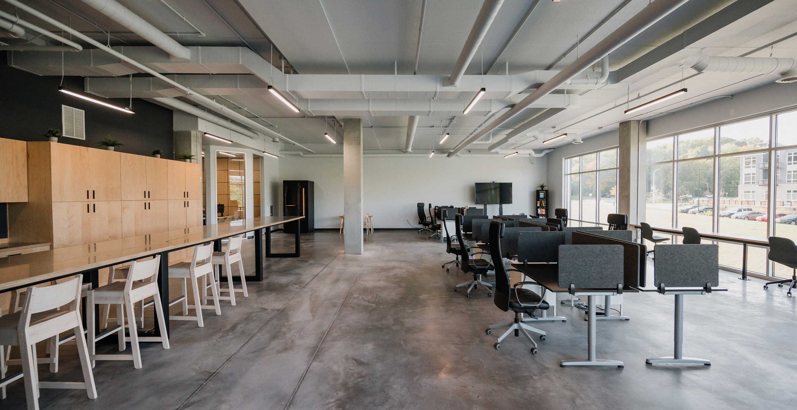 RiverHeath Willow mixed-use office interior with flexible work areas and polished concrete flooring.