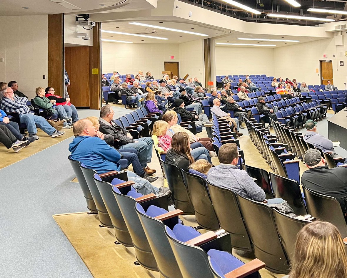 School Auditorium with community members attending a session with CD Smith Construction for education event to support school facility