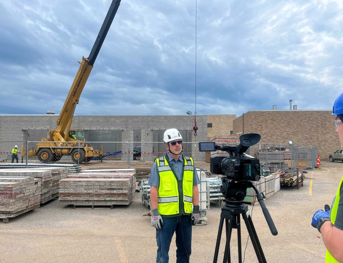 School District of Rhinelander Construction Project Progress Update with CD Smith Superintendent in front of crane on Wisconsin jobsite