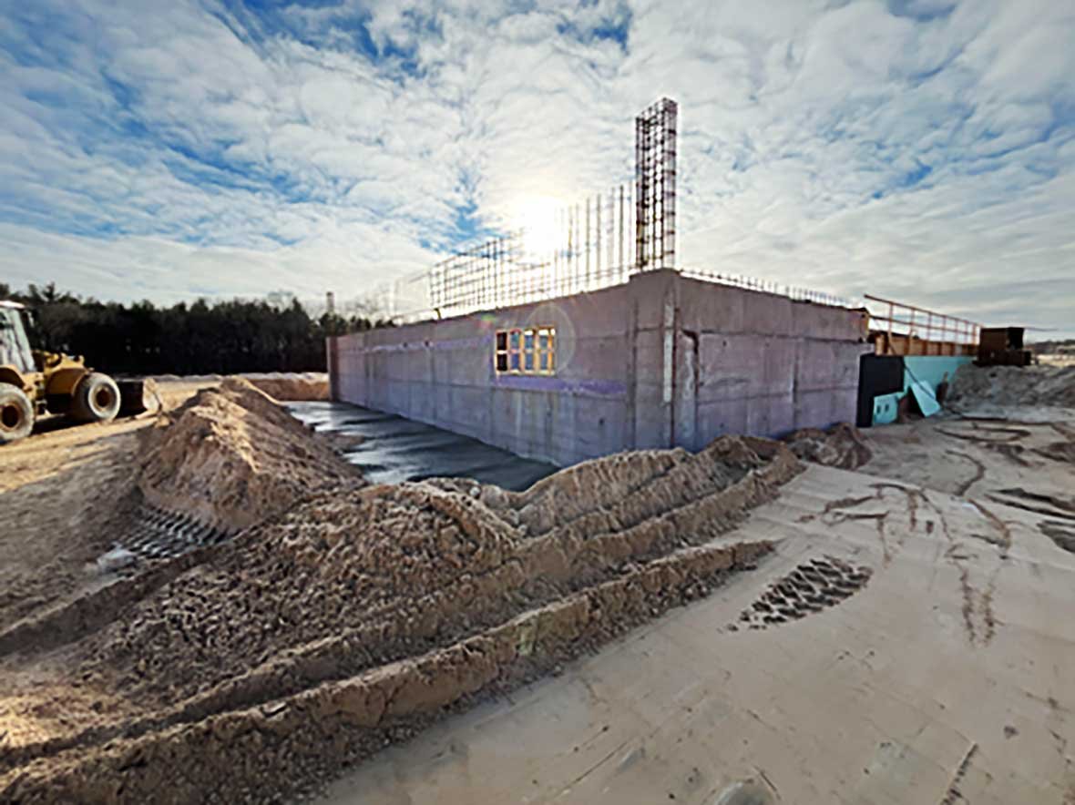 Reinforced concrete structure under construction at the Reedsburg, Wisconsin Wastewater Treatment Plant, showcasing sustainable municipal infrastructure and resilient concrete work