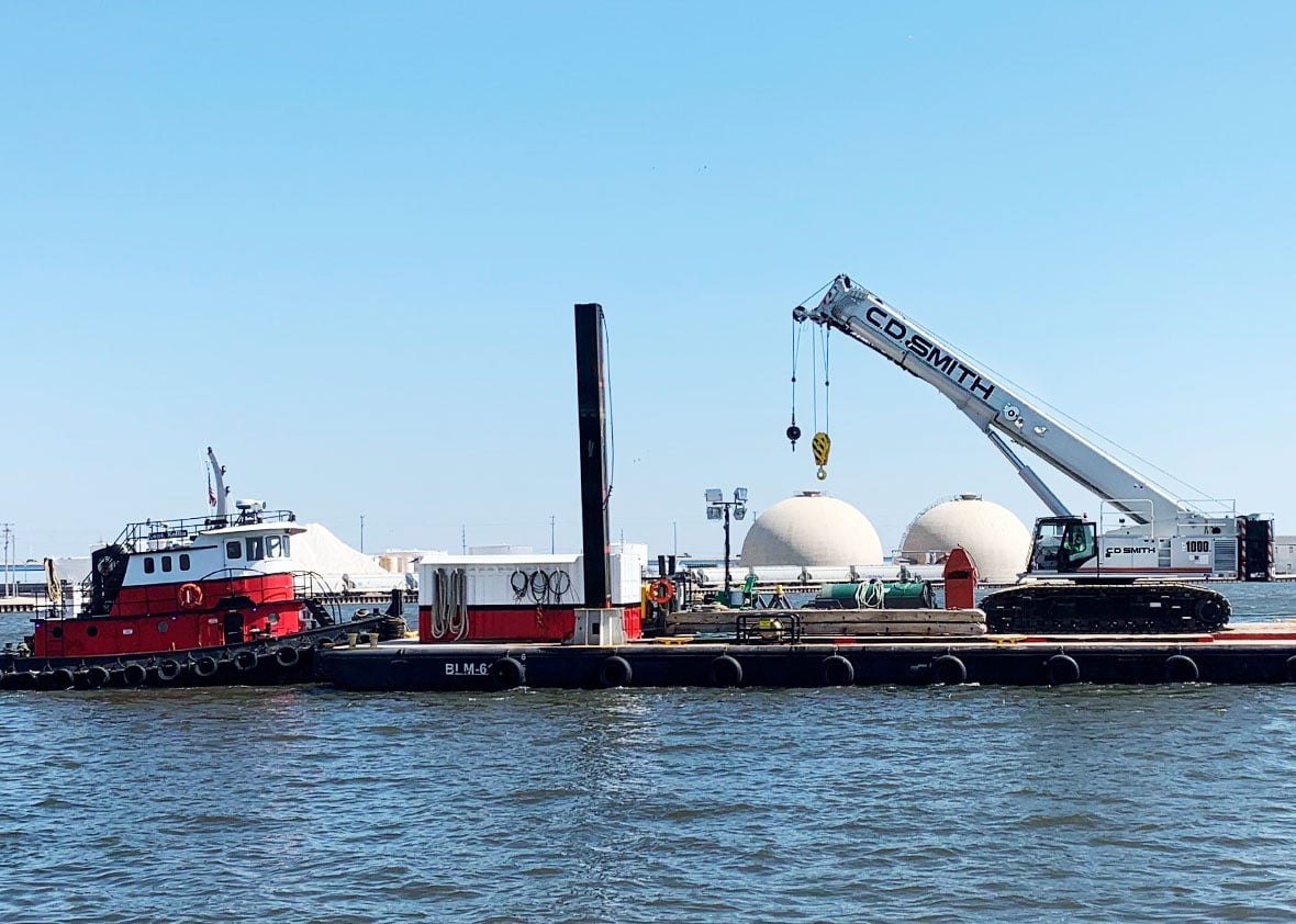 Telescopic Crawler Crane Custom Built & Delivered by Barge for C.D. Smith Construction Fleet Heavy Equipment Operators.