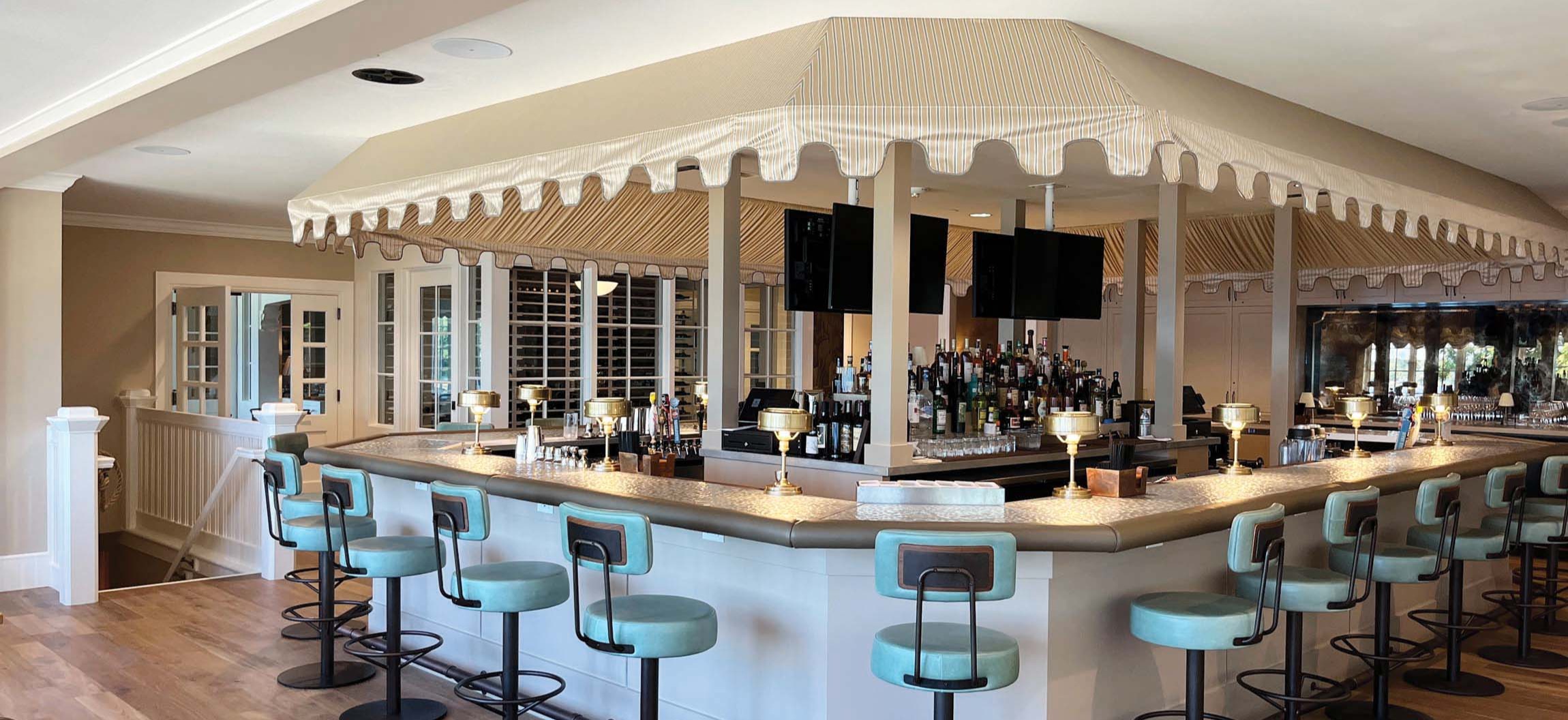 Bar at The Commodore with copper countertop and custom millwork