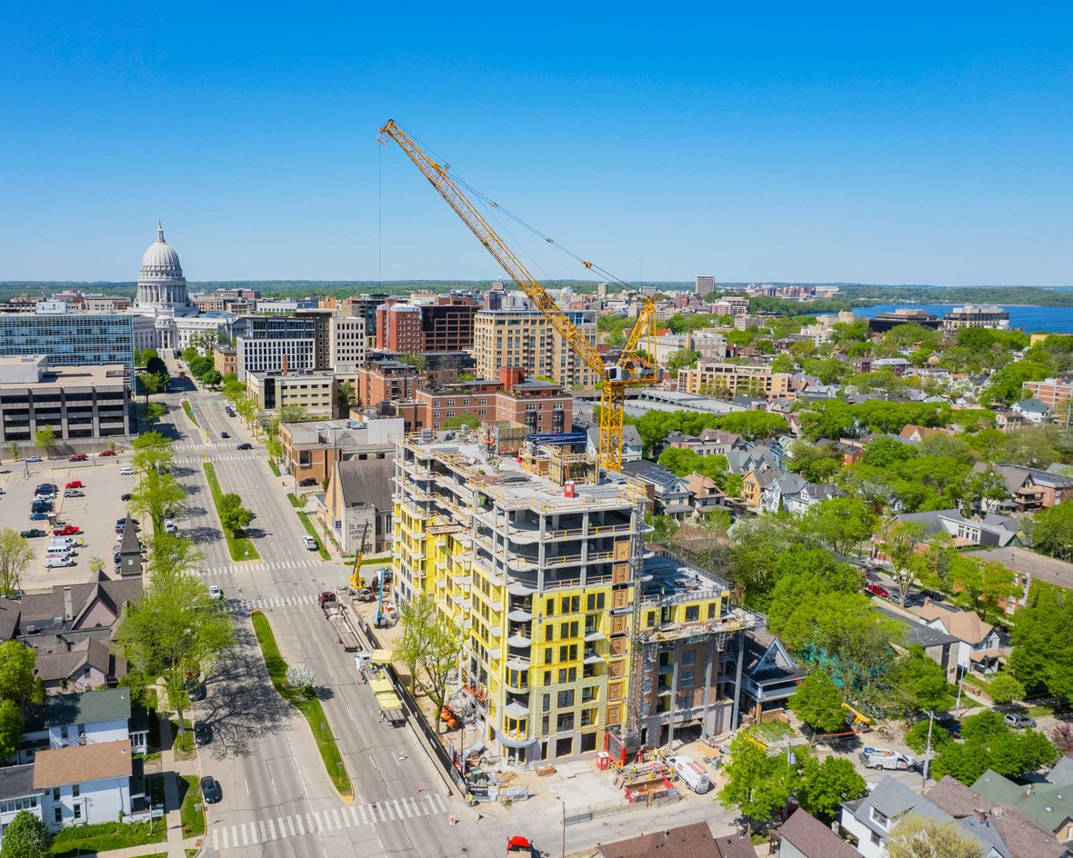 The Continental Luxury Apartments with CD Smith Construction crane and Wisconsin capitol in Madison background 02