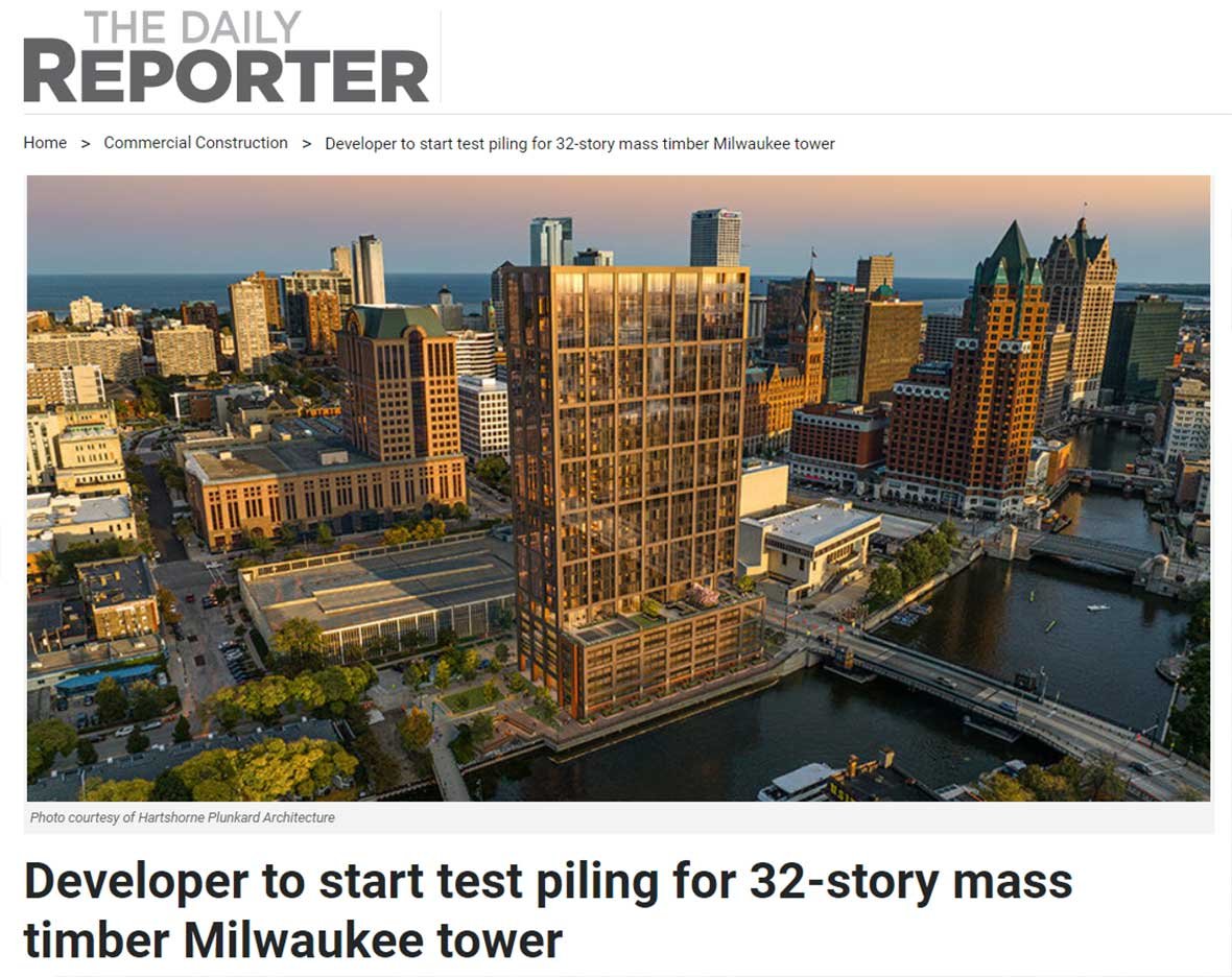 The Edison mass timber building aerial view rendering on the river in Milwaukee Wisconsin for The Daily Reporter article