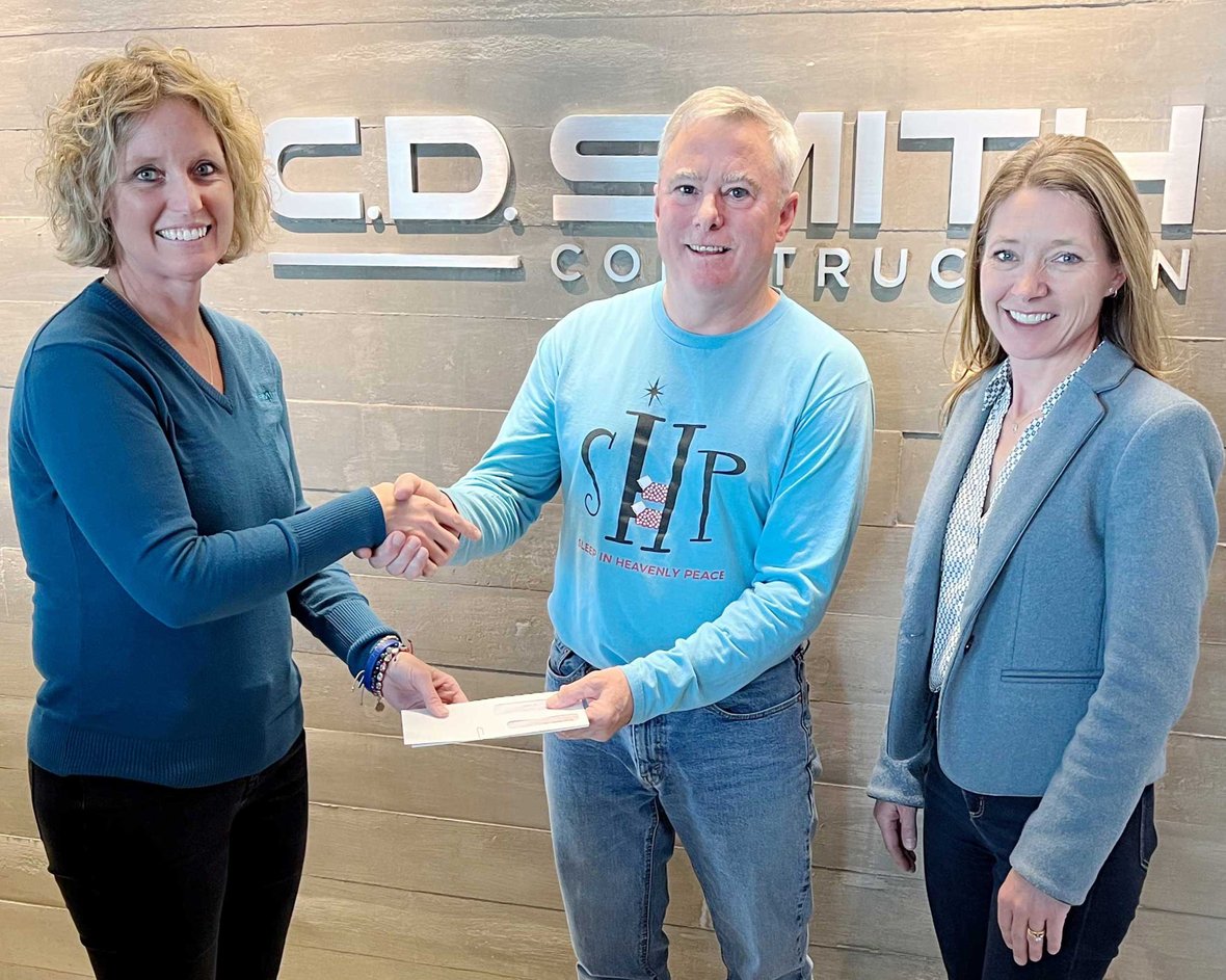 Connie Coon (at left ) and Holly Brenner (at right) pictured with SHP WI-Waukesha Chapter Co-President Tim Culhane at C.D. Smith Construction's Fond du Lac Office