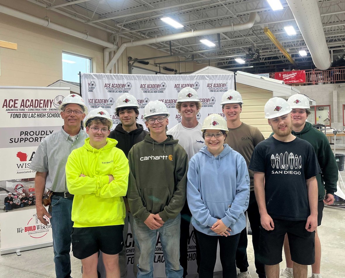 Fond du Lac High School ACE Academy graduating seniors with instructor Vern Widmer at the 2025 signing event, celebrating youth apprenticeship and skilled trades education in Wisconsin.
