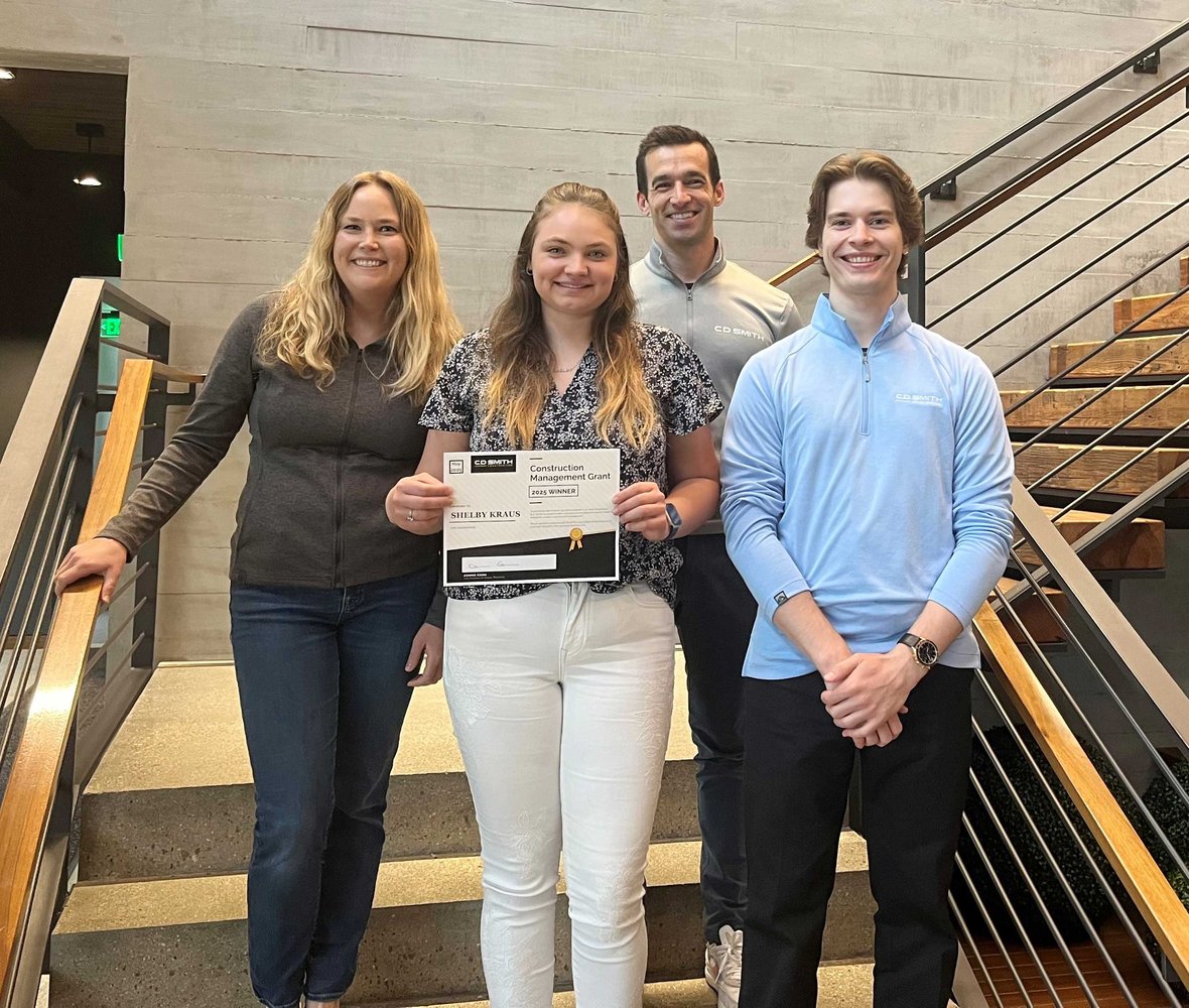 Shelby Kraus with C.D. Smith team members Grace Fowler, C.J. Smith, and Egor Shalamov at the C.D. Smith corporate office in Fond du Lac, Wisconsin, highlighting youth apprenticeship and construction management education.