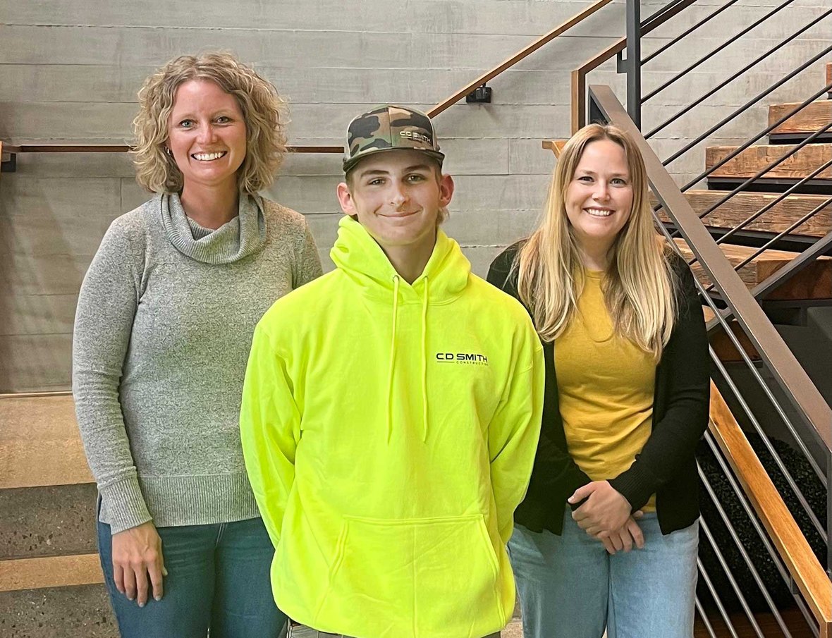 Logan Pluim with Connie Coon and Grace Fowler at the C.D. Smith corporate office in Fond du Lac, Wisconsin, recognized for skilled trades youth apprenticeship achievement.
