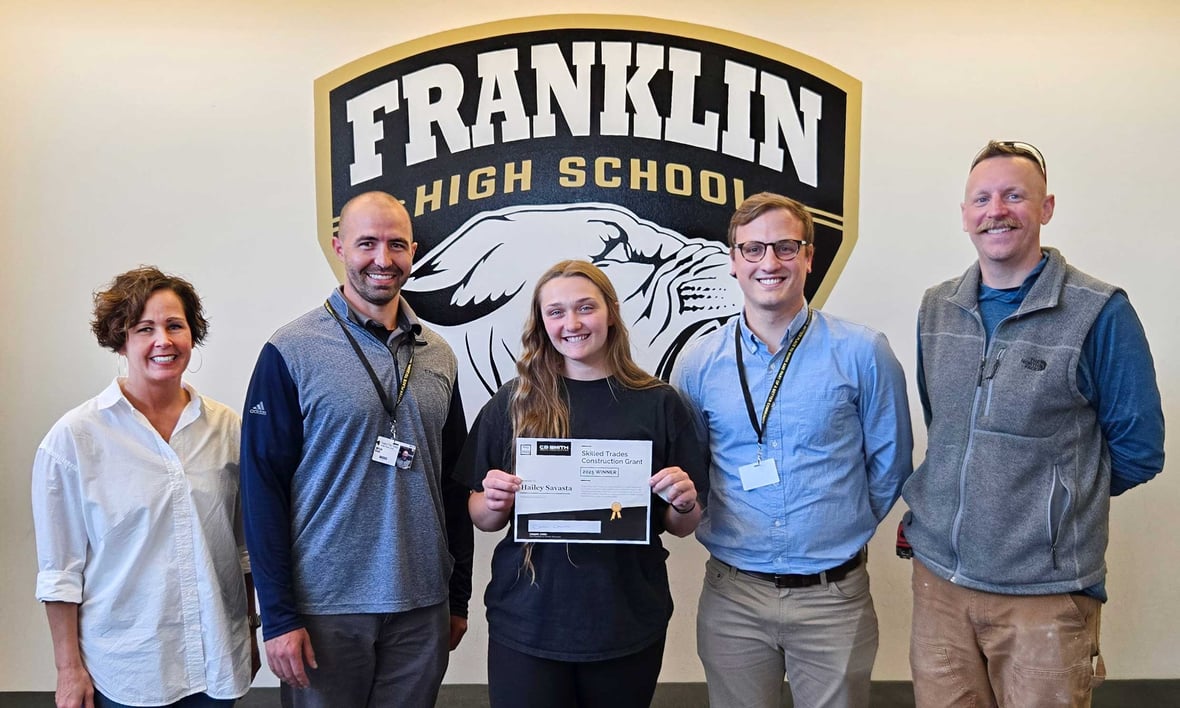 Hailey Savasta with Mitch Kidd and Phil Jaskolski from C.D. Smith and the Franklin High School team during the skilled trades grant certificate presentation in Wisconsin.