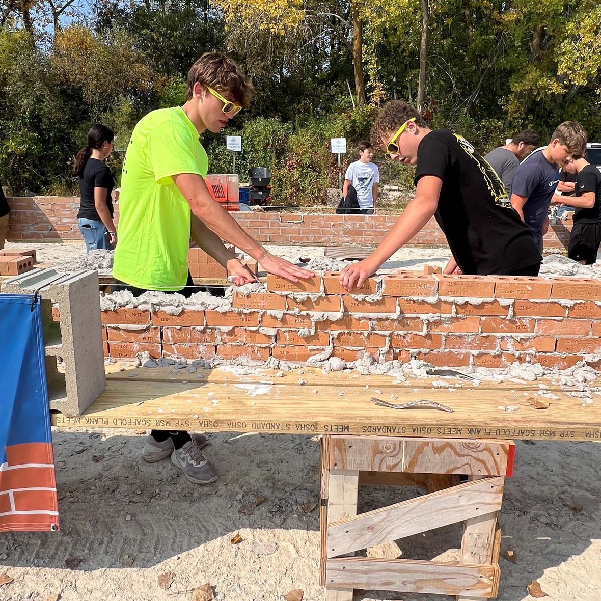 Wisconsin high school students practice masonry with CD Smith Construction at Bricklayer 500 in Fond du Lac Wisconsin