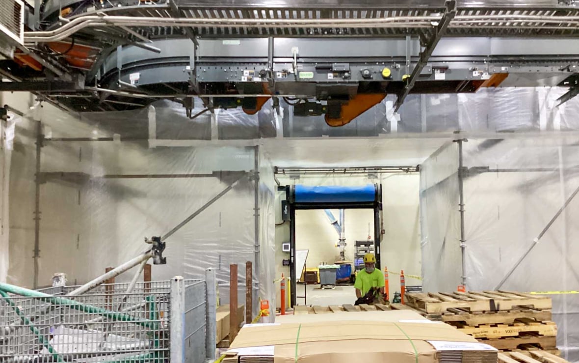 Temporary containment system installed inside the Campbell Snacks Franklin facility to allow dust collection upgrades while food production continued.